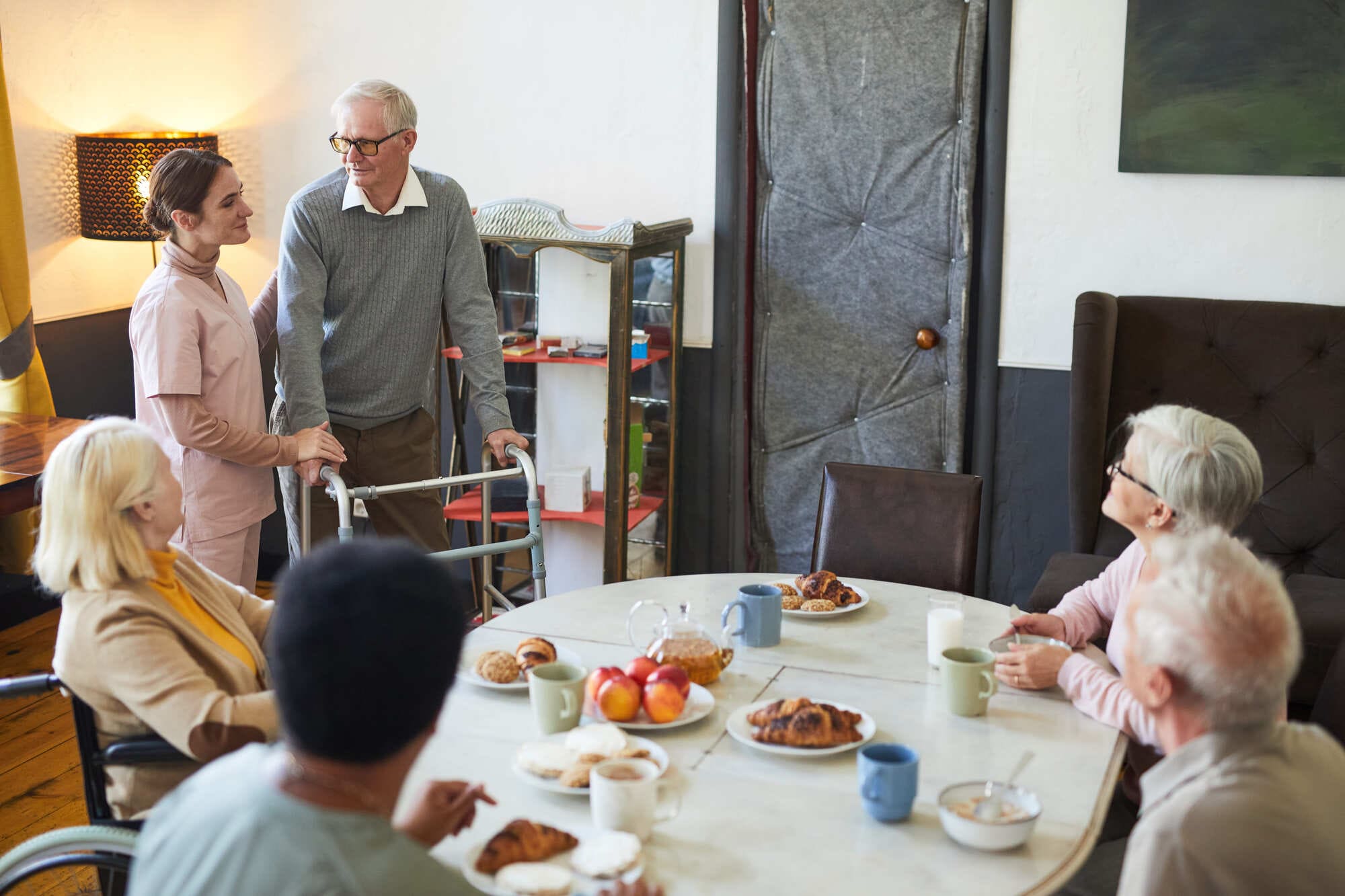 Modern dining room with residents enjoying a meal